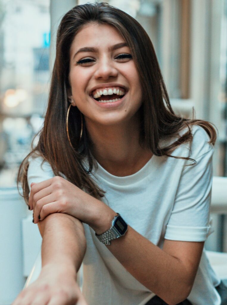 woman with positive energy laughing 