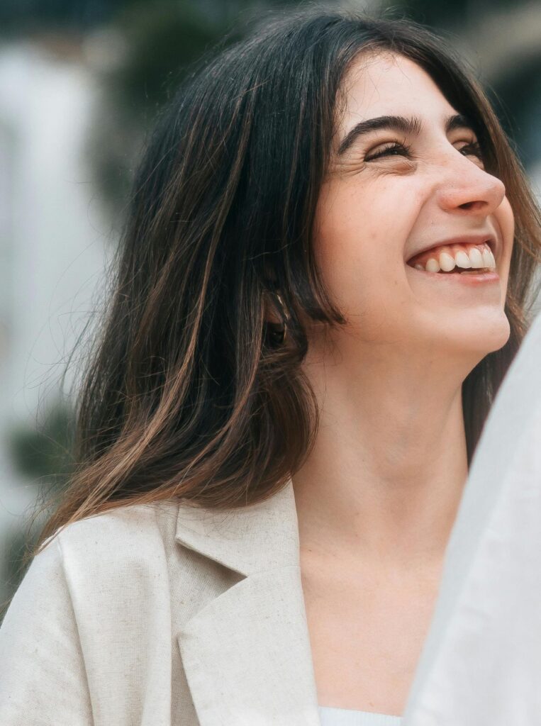 woman smiling huge